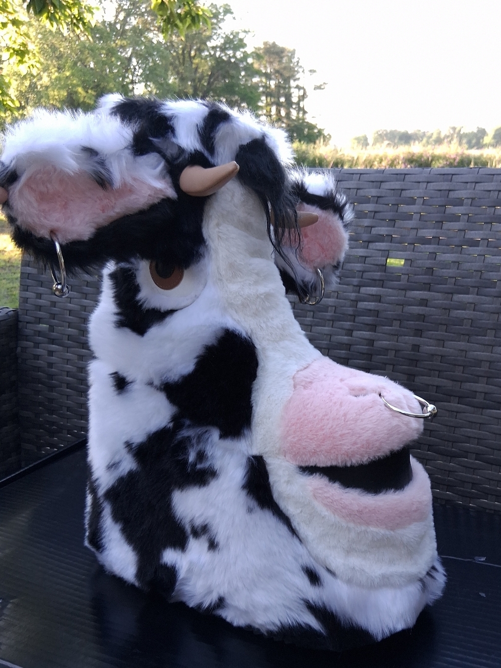 dELiA*s by Dolls Kill® Wildlife Novelty Cow Faux Fur Platform Booties | Size 8